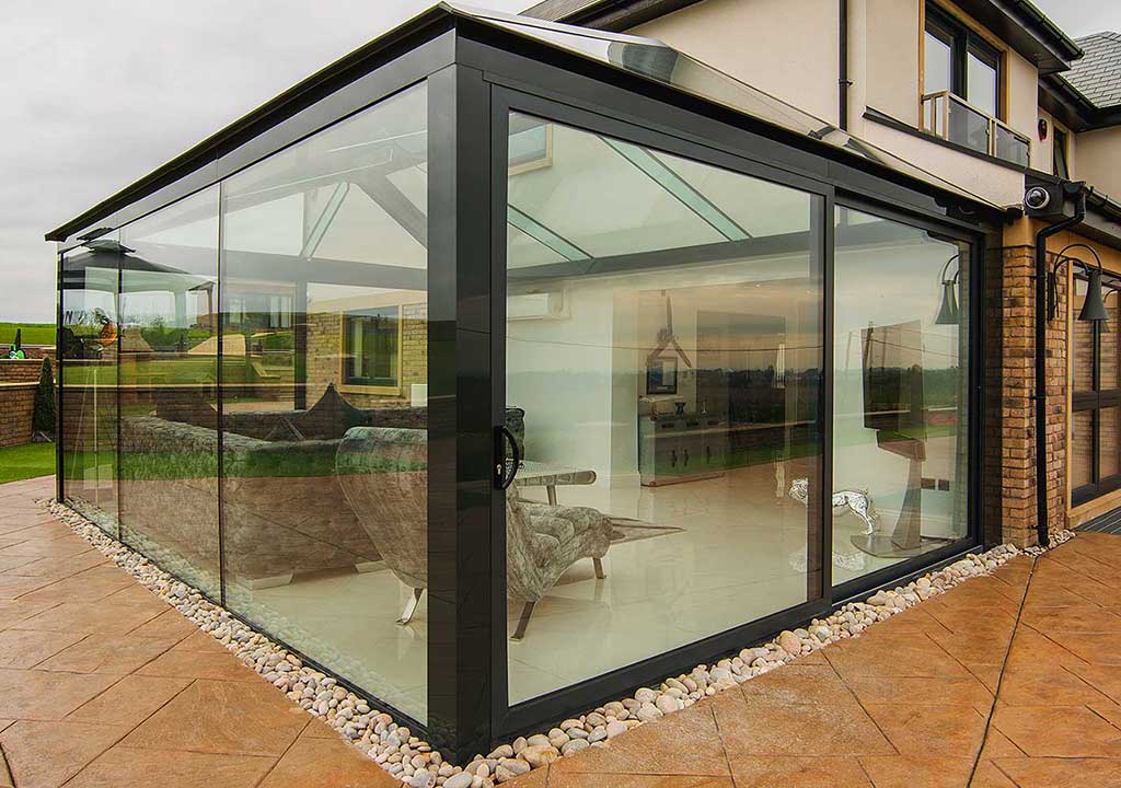 extension maison moderne en verre